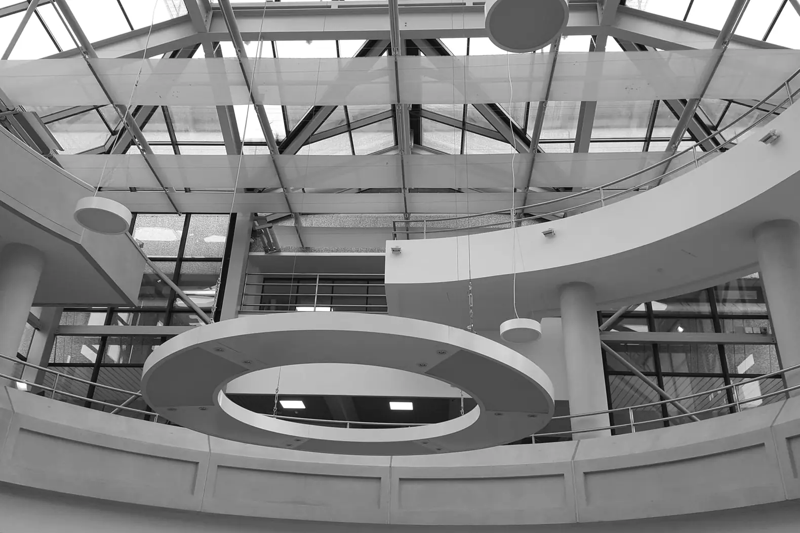 The glazed roof and curved galleries inside The National Archives at Kew